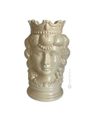 CABEZA MARRÓN FEMENINA Maceta y decoración artística de mesa en cerámica.