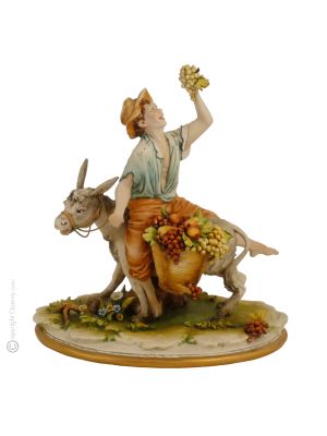 NIÑO SOBRE BURRO Figura de porcelana Capodimonte hecha a mano Made in Italy