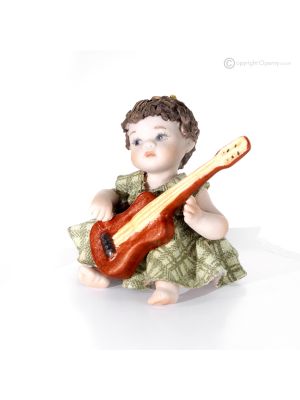 DINA - Muñecas de porcelana, música con guitarra, arte en cada detalle.