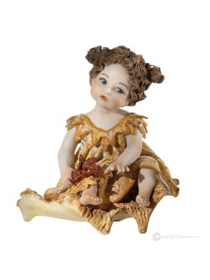 VERANO Representación de las estaciones en porcelana.