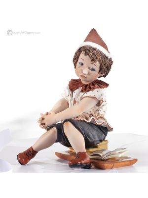 PINOCHO Estatuilla de cuento de hadas de Capodimonte, dije italiano en porcelana.