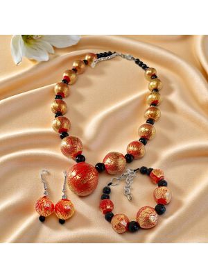 Elegante conjunto de cristal soplado de Murano con pan de oro de 24k: collar, pulsera y pendientes.